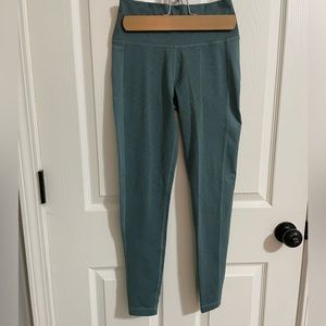 Teal Adidas leggings with fun geometric pattern